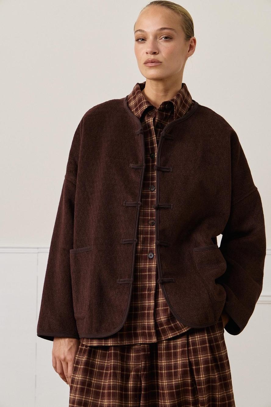 Oversized bunda s vreckami